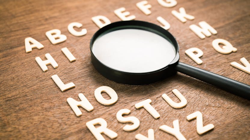 Magnifying glass, lexicon, glossary
