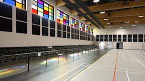 Gymnasium in Gymnase communal de Batilly in Batilly France with Rockfon VertiQ Metal