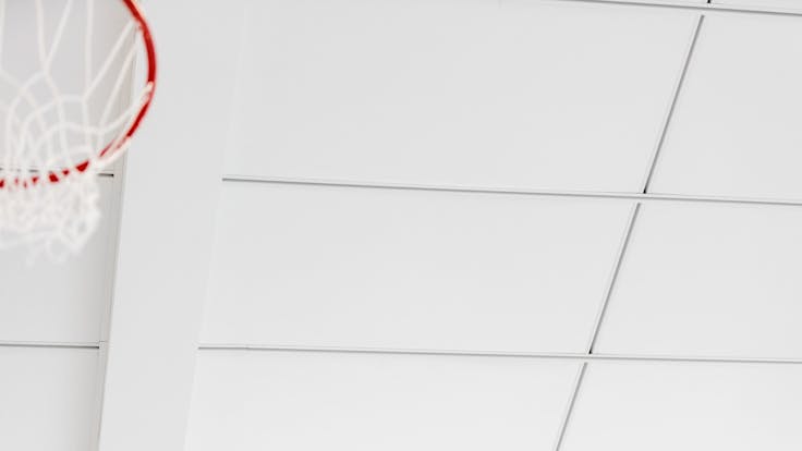 Parafon Buller Solid Wall Ceiling in colour white at Almby High School Sports Hall in Örebro, Sweden