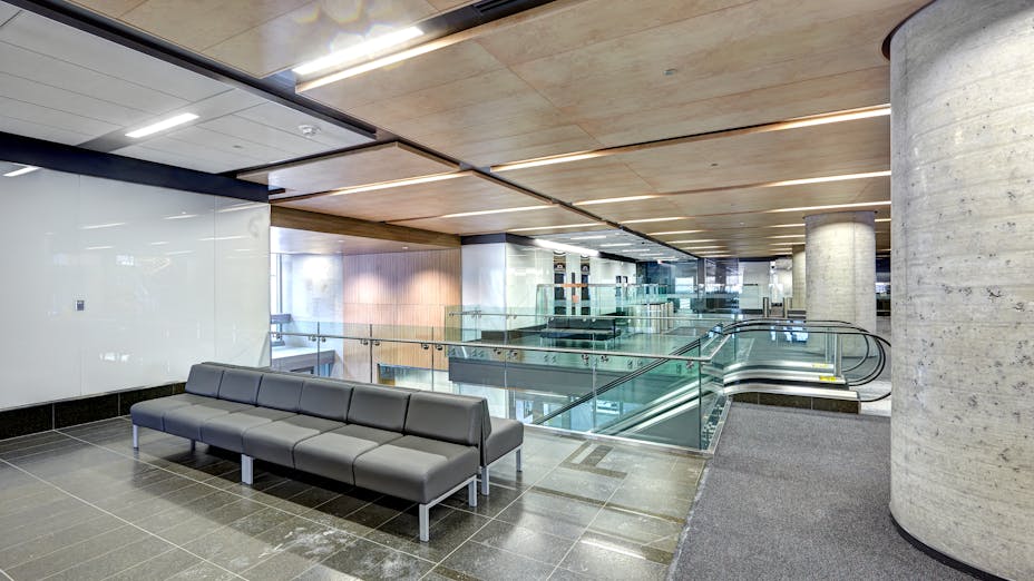 Rockfon SpanAir Hook-on, Planostile Lay-in, reveal edge metal ceilings installed in office building.