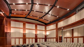 Dannelly Composite Operations and Training Facility's Auditorium, Alabama Army and National Air Guard, Seay-Seay & Litchfield Architects, Bear Brothers, Inc., E&E Acoustical and Drywall, Inc., SpanAir Torsion Spring Panels, Infinity Perimeter Trim, Custom WoodScenes, Walnut Painted Finish, Government, Curt Ullery