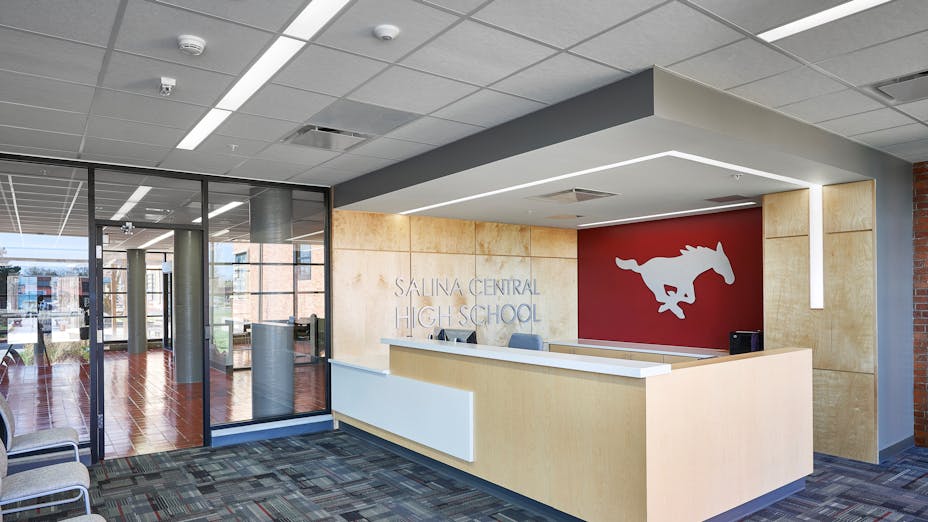 Rockfon ceiling tiles, grid and perimeter trim create a refreshed entrance to the school