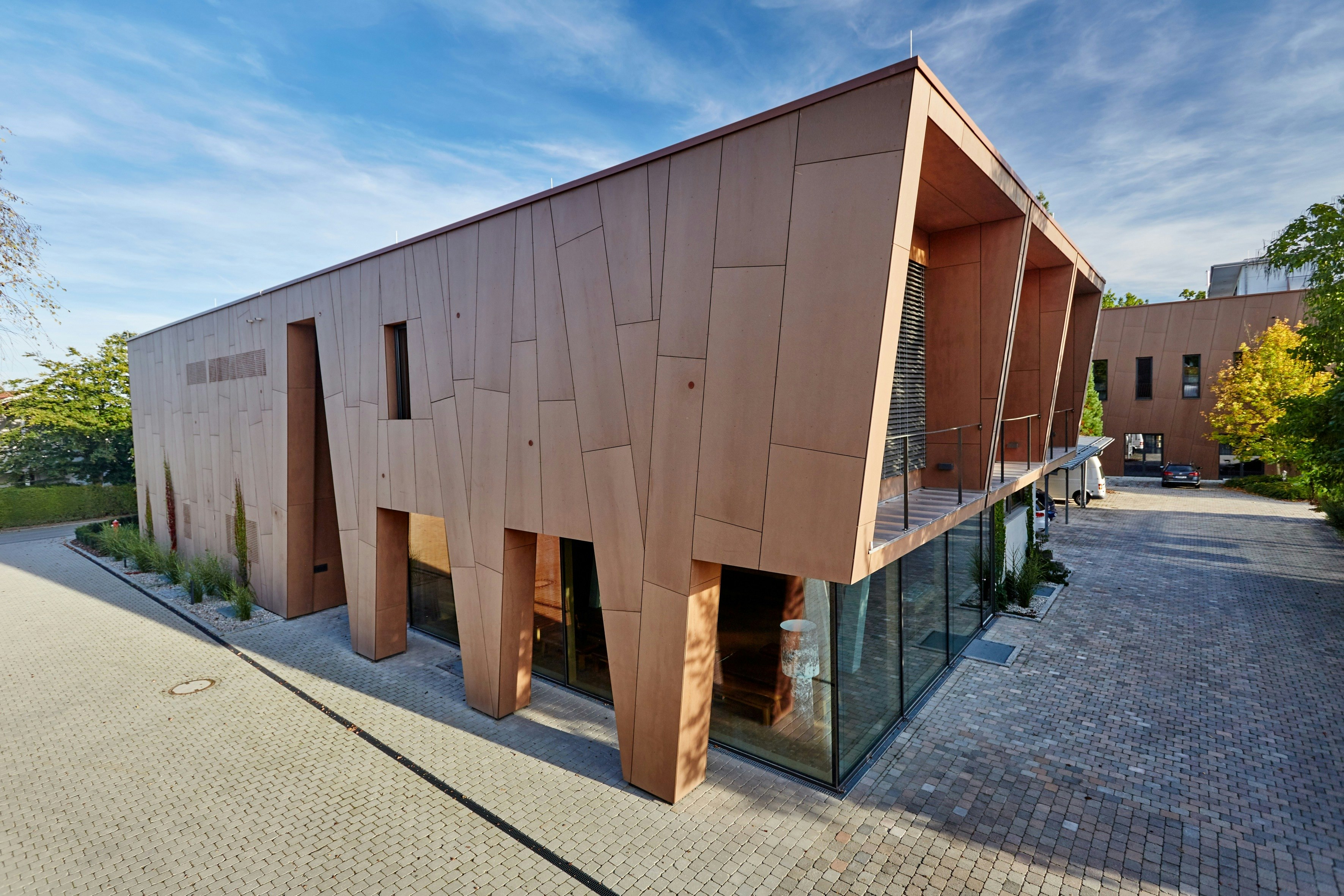 Office/production building with Rockpanel Natural facade cladding in Eggenfelden, Germany.