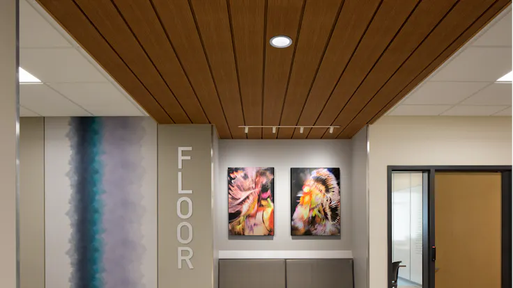 NA, Madison Area Technical College, Goodman South Campus, Rockfon® Planar® Linear Metal Ceilings, Infinity™ Perimeter Trim in Metalwood® Oak woodgrain finish, Corridor