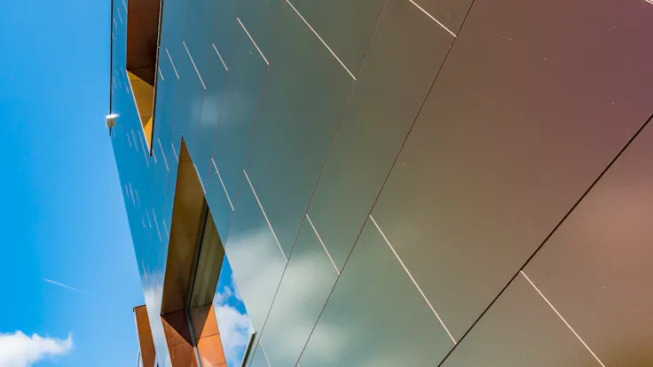 Sherwin office in Kortenberg, Belgium cladded with Rockpanel Chameleon facade cladding.
