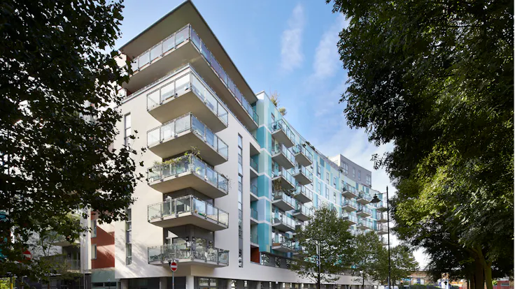 Eyot House (Multi Family House) in Bermondsey, London, United Kingdom cladded with A2 (FS-Xtra) in seven RAL colours plus Metallics Graphite Grey and Woods Cherry facade cladding.