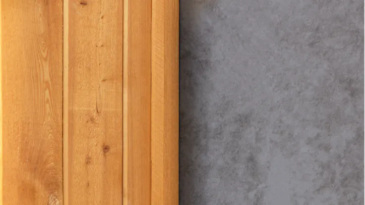 Sports hall 'Lärkan' in Sala, Sweden cladded with Rockpanel Stones Mineral Rust and Basalt Iron facade cladding.