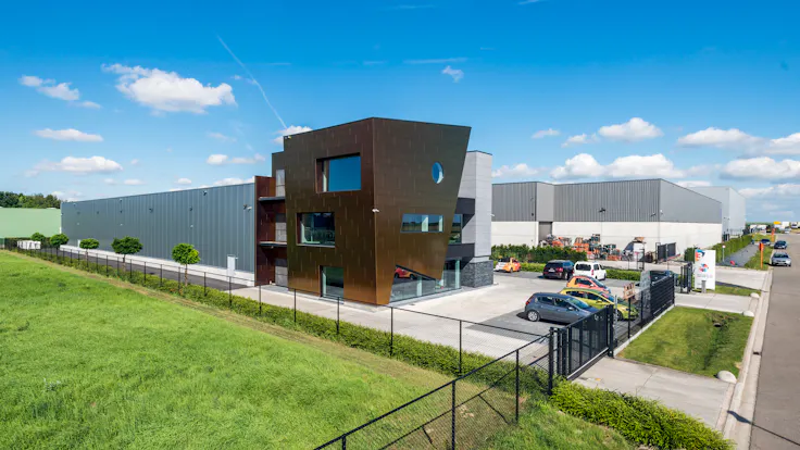 Sherwin office in Kortenberg, Belgium cladded with Rockpanel Chameleon facade cladding.