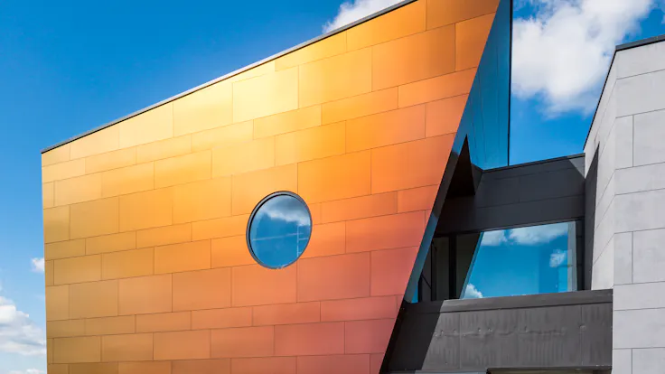 Sherwin office in Kortenberg, Belgium cladded with Rockpanel Chameleon facade cladding.