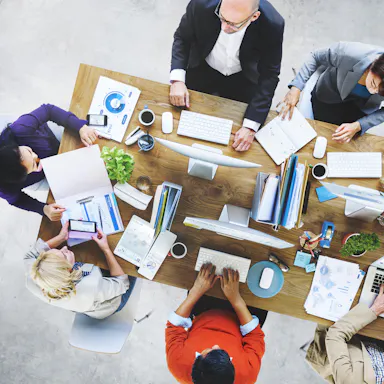 Illustrative image, office, meeting, collaboration, mobile devices, laptops