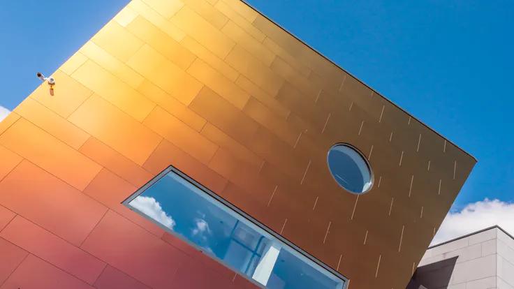 Sherwin office in Kortenberg, Belgium cladded with Rockpanel Chameleon facade cladding.