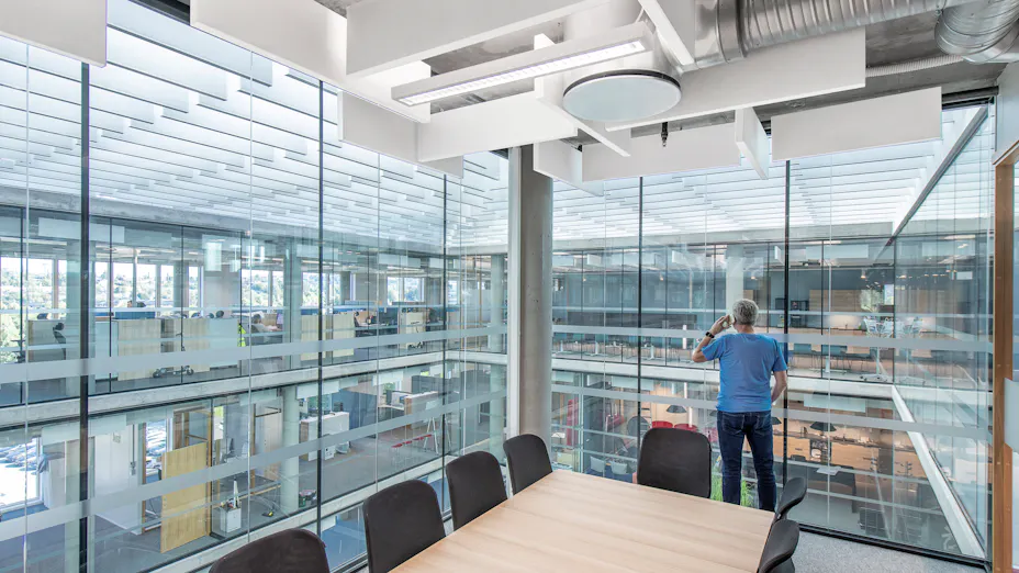 Acoustic free-hanging baffles installed in office