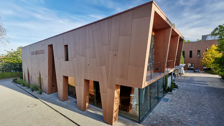 Office/production building with Rockpanel Natural facade cladding in Eggenfelden, Germany.