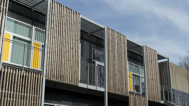 Klostermarksskolen in Roskilde, Denmark cladded with Rockpanel Colours RAL 7016 and RAL 7021 facade cladding