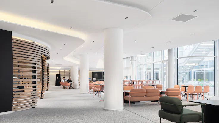 Open plan office in New flexible office So Pop in Saint-Ouern-sur-Seine France with Rockfon Mono Acoustic TE-Edge