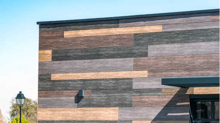 Sale de Sports in Celles, Belgium cladded with Rockpanel Woods facade cladding