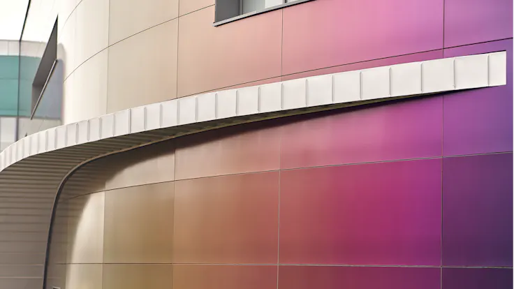 Swimming pool Wodny Park in Tychy, Poland cladded with Rockpanel Chameleon facade cladding