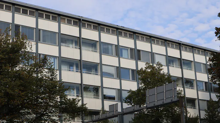 As Oy Kotikannas Case Study FinlandRockpanel Colours RAL9010, RAL7024 and RAL7031