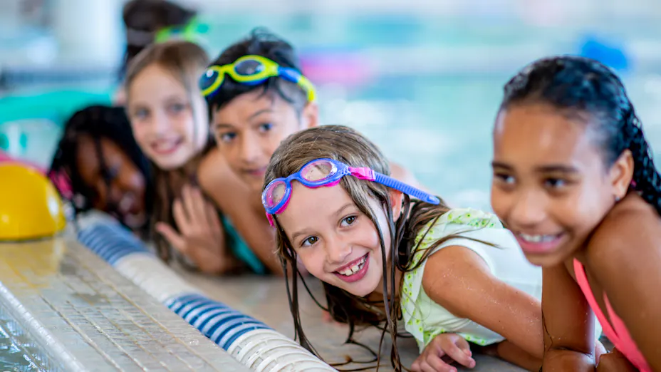 Kids playing in swimming pool area with perfect acoustics