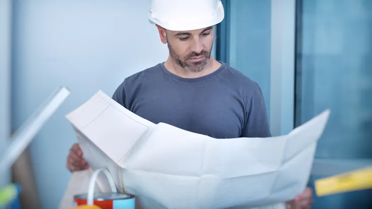 Illustrative image, architect, builder, worker, layout plan, blueprint, documents, construction site