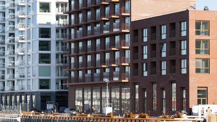 wooncomplex op ndsm, noordbaak, koop- en huurappartementen, ij, owner-occupied and rental apartments, gevel, facade, referentie, reference project, amsterdam, nederland, netherlands, koninklijke jongeneel, rw-bnl, nl