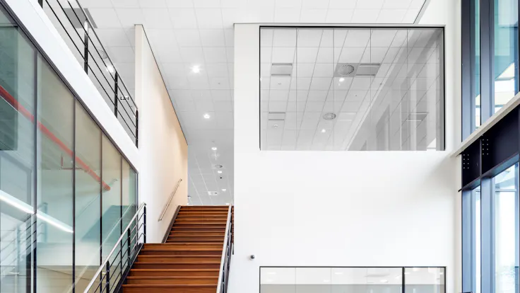 Open Plan Office in Distributiecentrum Nabuurs II in Haps Netherlands with Rockfon Krios A15-Edge