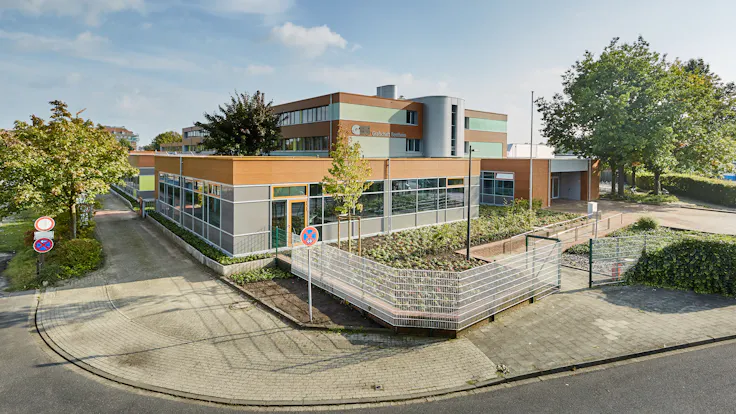 GBS Nordhorn in Nordhorn, Germany cladded with Rockpanel Woods and Chameleon facade cladding