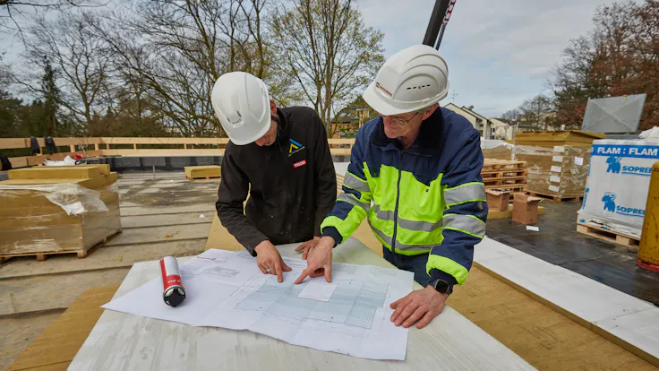 kita hilden, referenz kita hilden, Kindertageseinrichtung Am Holterhöfchen, flachdach pv-anlage, flat roof pv system, belastbares Flachdach, resilient flat roof, nachhaltiger Modulbau, sustainable modular construction, Planbesprechung, Job 2340 Foto Behrendt, reference, Referenz, Germany