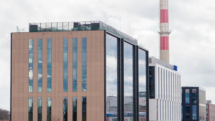 Bonarka For Business, Building F of B4B Office Park in Krakow, Poland, cladded with Rockpanel Woods facade cladding