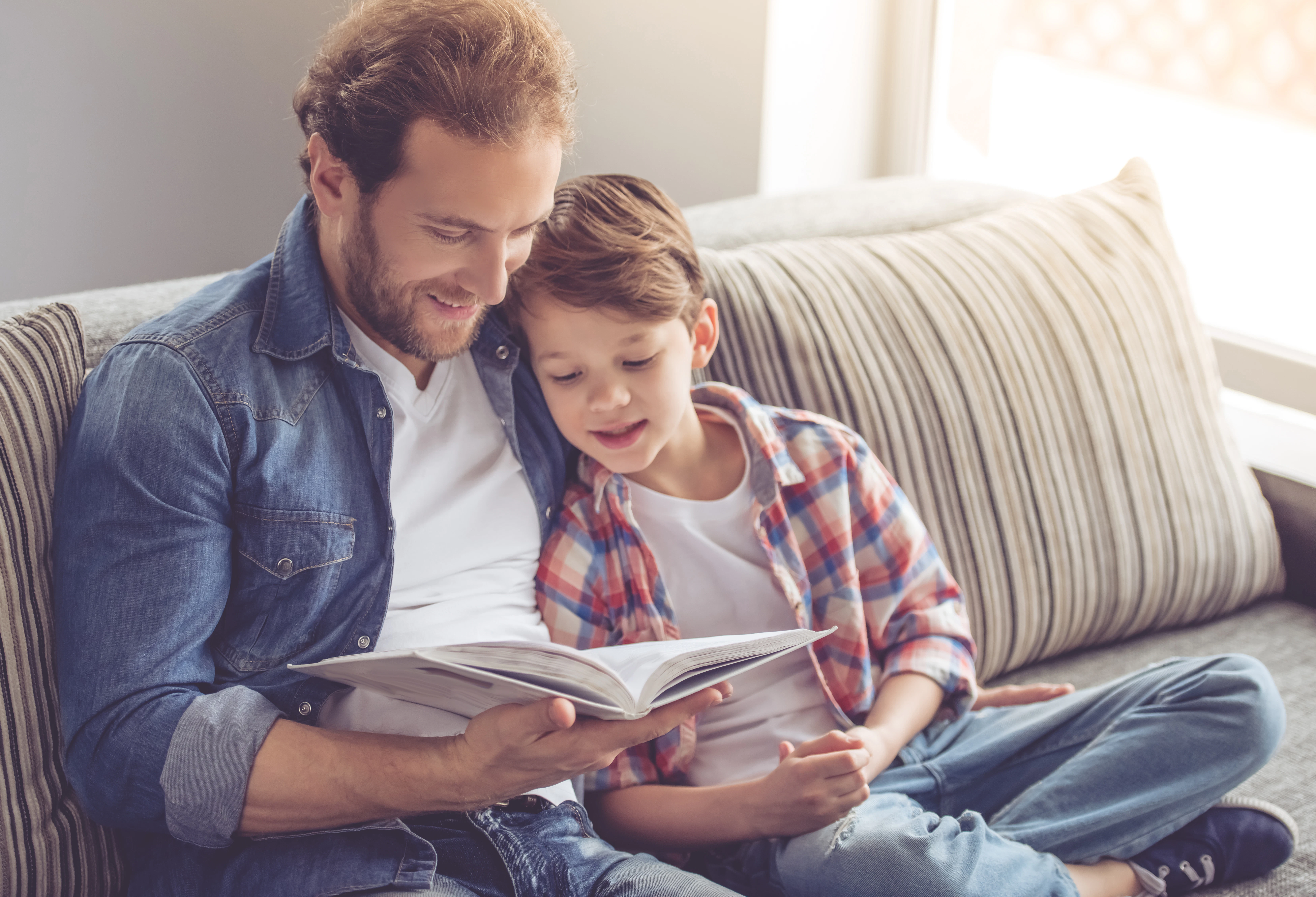 Father and son reading