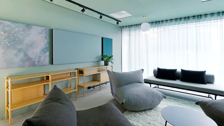 Meeting Room in Paytrail in Tampere Finland with Rockfon Canva Wall panel A-Edge and Rockfon Color-all X-Edge in Sage