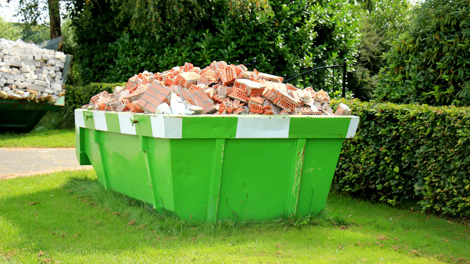 Container filled with construction waste