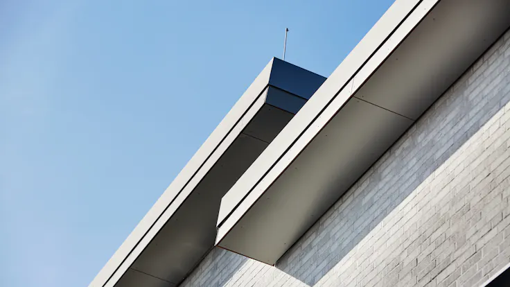 The Christophorus school in Mülheim-Kärlich (Germany) with (engraved) Rockpanel Metallics and Rockpanel Colours exterior cladding boards