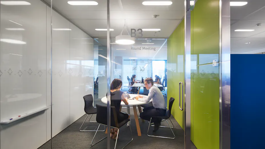 Rockfon acoustic ceiling tiles installed in office meeting room.