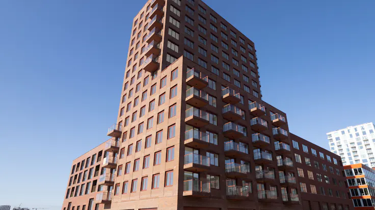 wooncomplex op ndsm, noordbaak, koop- en huurappartementen, ij, owner-occupied and rental apartments, gevel, facade, referentie, reference project, amsterdam, nederland, netherlands, koninklijke jongeneel, rw-bnl, nl