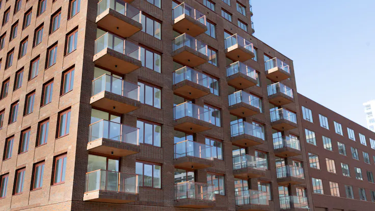 wooncomplex op ndsm, noordbaak, koop- en huurappartementen, ij, owner-occupied and rental apartments, gevel, facade, referentie, reference project, amsterdam, nederland, netherlands, koninklijke jongeneel, rw-bnl, nl