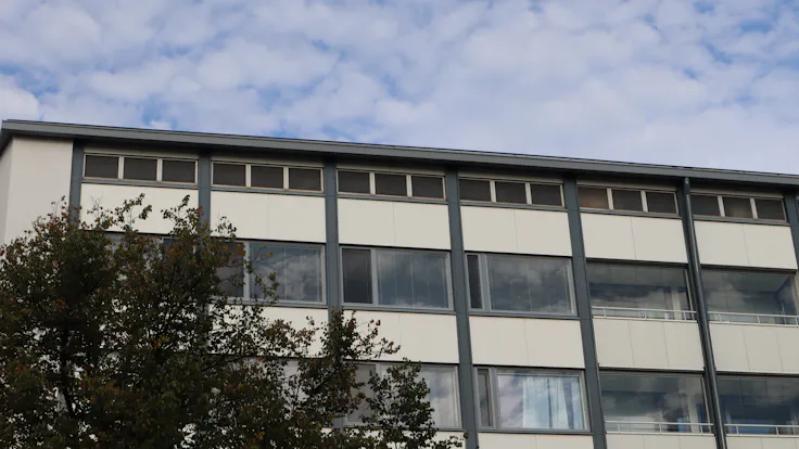 As Oy Kotikannas Case Study FinlandRockpanel Colours RAL9010, RAL7024 and RAL7031