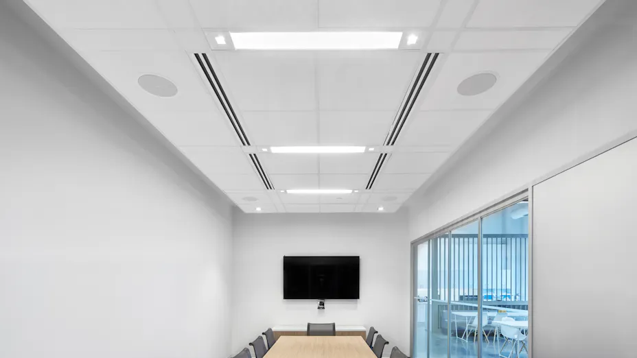 Rockfon Sonar and Chicago Metallic 4000 Tempra 9/16" enhance this secluded conference room in Aercoustics