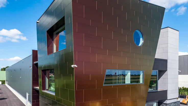 Sherwin office in Kortenberg, Belgium cladded with Rockpanel Chameleon facade cladding.