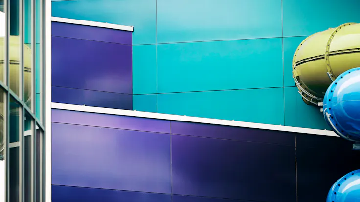 Swimming pool Wodny Park in Tychy, Poland cladded with Rockpanel Chameleon facade cladding