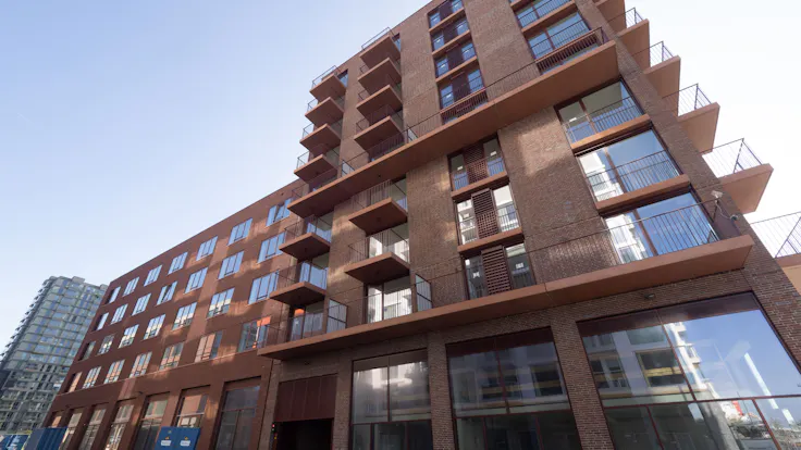 wooncomplex op ndsm, noordbaak, koop- en huurappartementen, ij, owner-occupied and rental apartments, gevel, facade, referentie, reference project, amsterdam, nederland, netherlands, koninklijke jongeneel, rw-bnl, nl