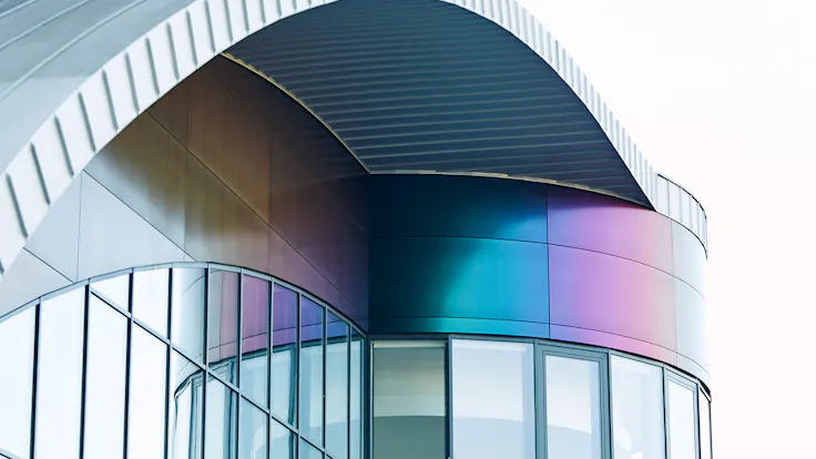 Swimming pool Wodny Park in Tychy, Poland cladded with Rockpanel Chameleon facade cladding