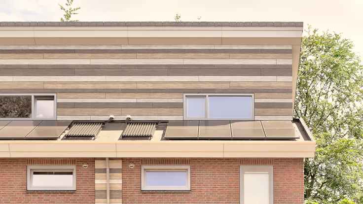 Houses in Wijbosch, Netherlands cladded with Rockpanel Woods facade cladding