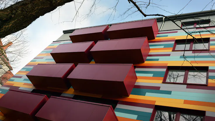 Renovation of a Multi Family Housing in Hannover, Germany with Rockpanel Colours exterior cladding