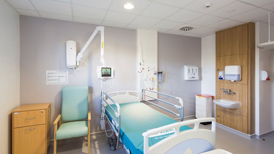 Rockfon MediCare acoustic ceiling tiles installed in patient room at Glenfield Hospital, UK